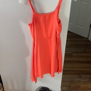 Size 12 in kids. Hot peach color. Short/mid rise. Zips up in the back